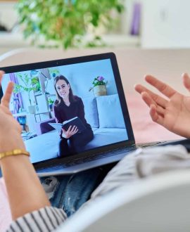 Online therapy meeting of woman with psychologist